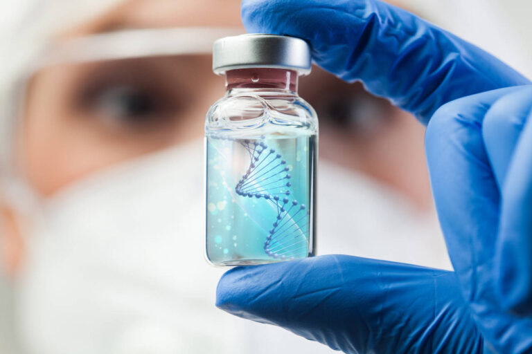 UK lab scientist biotechnologist holding glass ampoule vial with DNA strand,molecule of two polynucleotide chains forming double helix carrying Coronavirus genetic instruction,new strain RNA mutation